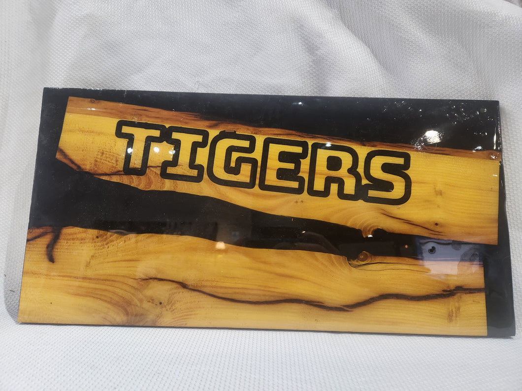 Tigers Board on Osage Orange